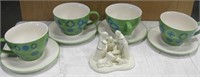 Lot Of Mugs And Saucers With A Figurine 2.5" Tall