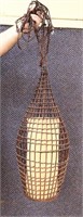 Vintage rattan framed swag lamp