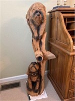 Hand carved Dog & Raccoon Statue