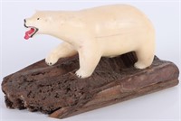 INUIT CARVED POLAR BEAR ON WOOD STAND C. 1970