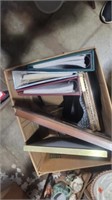 Lot of picture frames and albums