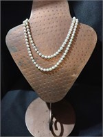 Genuine pearl necklace. 30" strand.