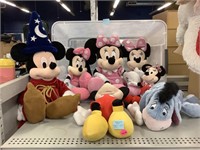 Assorted Disney plush dolls.