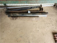 LOT OF SEVERAL PIECES OF METAL PIPE ON FLOOR