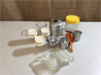 Glass, metal measuring cups, canisters