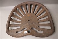 MCCORMICK CAST IMPLEMENT SEAT