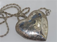 Very large silver heart locket