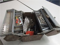 Vintage toolbox filled with tools
