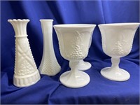 Milk glass stemware water goblets and two bud