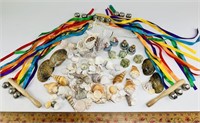 Sea shells, sleigh bells on wood handles with