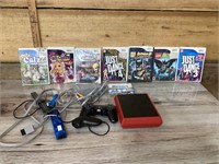 Wii console and games all games in cases,