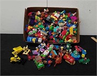 Kids Meal toys and a couple Tonka tractors