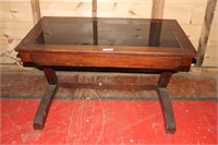 Wooden desk with glass top