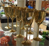 Eight brass wine goblets
