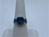 BLUE SWISS TOPAZ RING W/ SQUARE CENTER STONE AND
