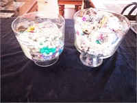 Two jars of costume jewelry including Trifari and