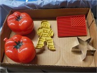 Plastic tomatoes, cookie cutters