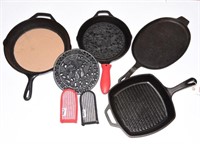 (4) Lodge Cast iron skillets in various sizes
