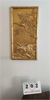 3 Brass-Colored Wall Hangings