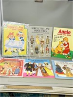 assorted paper doll cut out books
