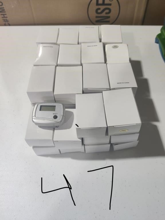 QTY 57 PEDOMETERS IN BOX