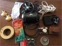 Box lot of misc items- camera, pump and more