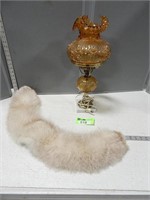 Electric lamp and a fur piece