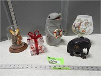 Glass globe; cookie jar; elephant statue; plastic