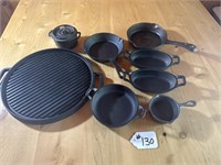 EIGHT PIECES OF CAST IRON COOKWARE