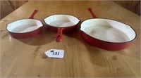 THREE PIECES OF ENAMEL COATED CAST IRON COOKWARE
