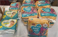 9) Pks of Easy up Pampers 2T-3t, 1) 3t-4t Essy
