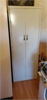 White metal cabinet Approx size is 65 inches tall