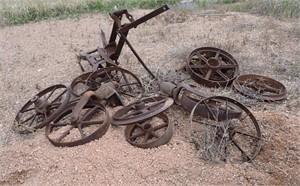 APPROX 11 IRON WHEELS, VARIOUS SIZES