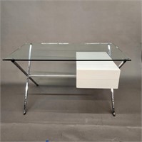 Modern chrome glass topped desk.