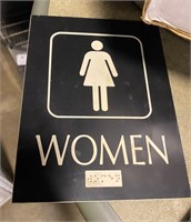 Women Braile restaurant sign