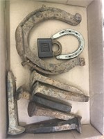 Lot of six railway spikes,
two horseshoes and an