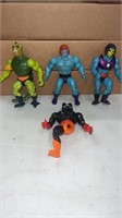 4 Masters of the universe figures.  1 is missing