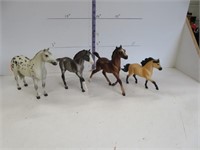 4 Breyer collectable horses