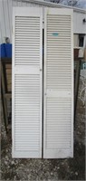 Two Tall Wooden Shutters