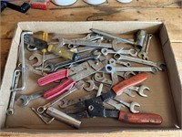 Lot of wrenches and other tools shown