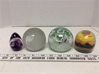 4 paperweights