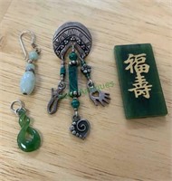 Green stone jewelry, three pieces look to be