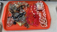 Tray lot  of costume jewelry - includes a cut pink