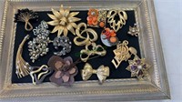 Collection of 16 costume brooches - gold tone,
