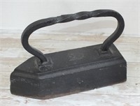 ANTIQUE IRON STAMPED 22