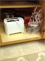 Pressure cooker, toaster, candle and rack