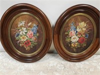 2 oval floral paintings