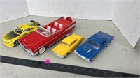 4 Plastic toy cars.