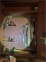 Tools inside of cabinet