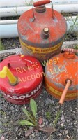 Three galvanized gas cans